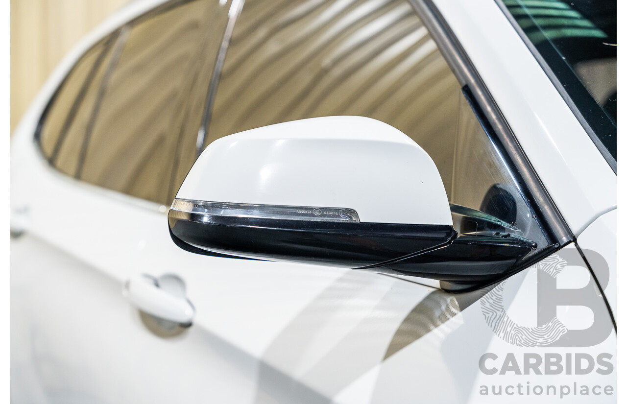 4/2015 BMW X1 Sdrive 20i Sportline E84 MY15 4d Wagon White Turbo 2.0L