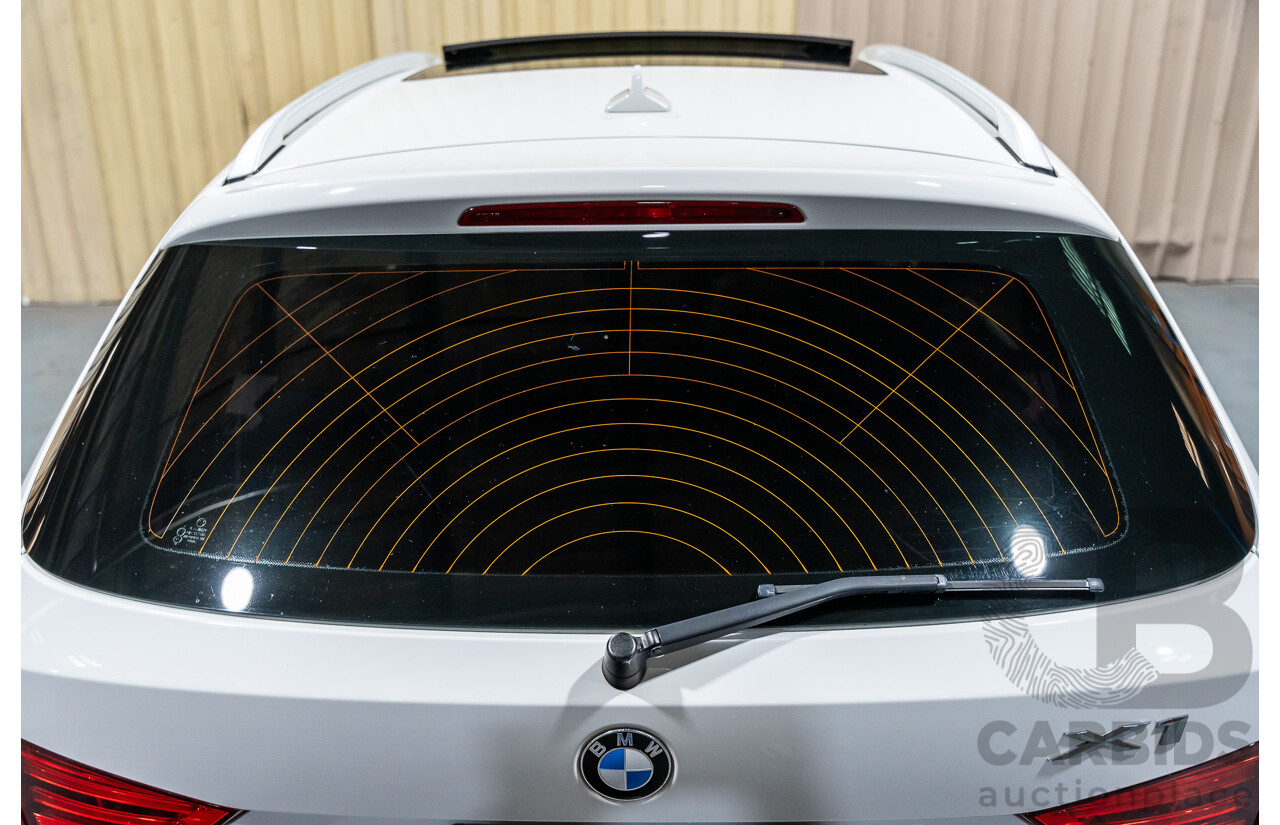 4/2015 BMW X1 Sdrive 20i Sportline E84 MY15 4d Wagon White Turbo 2.0L