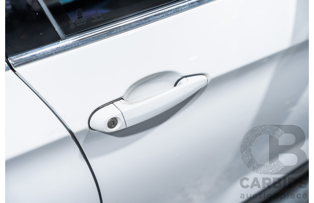 4/2015 BMW X1 Sdrive 20i Sportline E84 MY15 4d Wagon White Turbo 2.0L