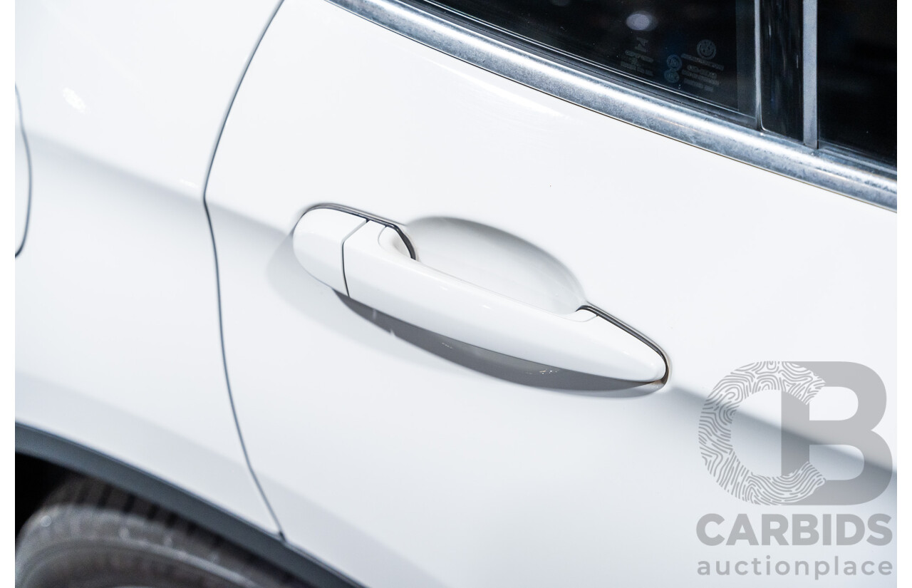 4/2015 BMW X1 Sdrive 20i Sportline E84 MY15 4d Wagon White Turbo 2.0L