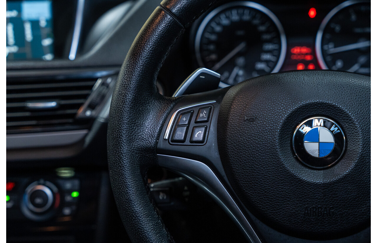 4/2015 BMW X1 Sdrive 20i Sportline E84 MY15 4d Wagon White Turbo 2.0L