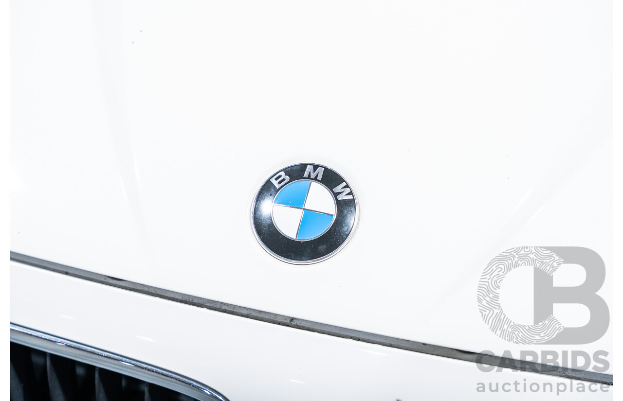 4/2015 BMW X1 Sdrive 20i Sportline E84 MY15 4d Wagon White Turbo 2.0L