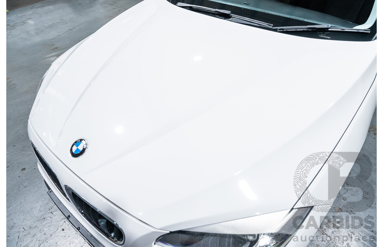 4/2015 BMW X1 Sdrive 20i Sportline E84 MY15 4d Wagon White Turbo 2.0L