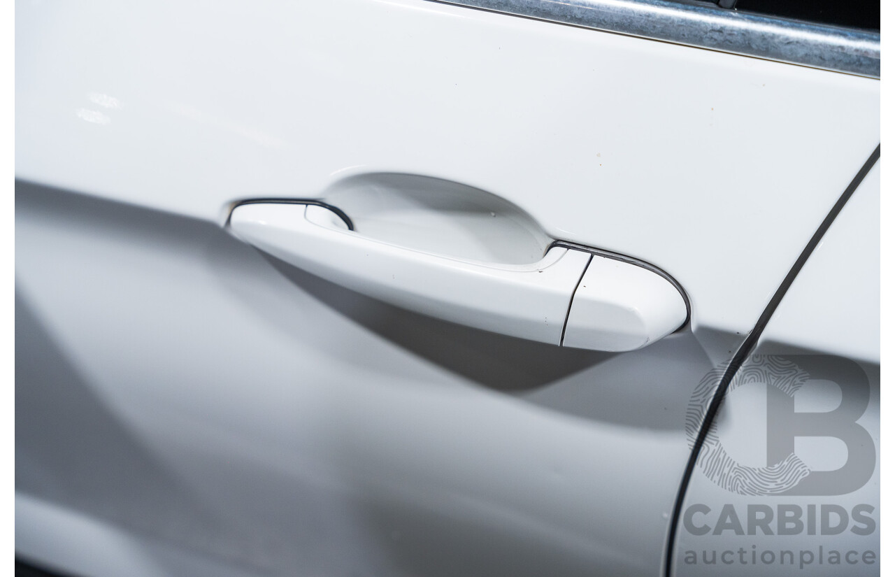 4/2015 BMW X1 Sdrive 20i Sportline E84 MY15 4d Wagon White Turbo 2.0L