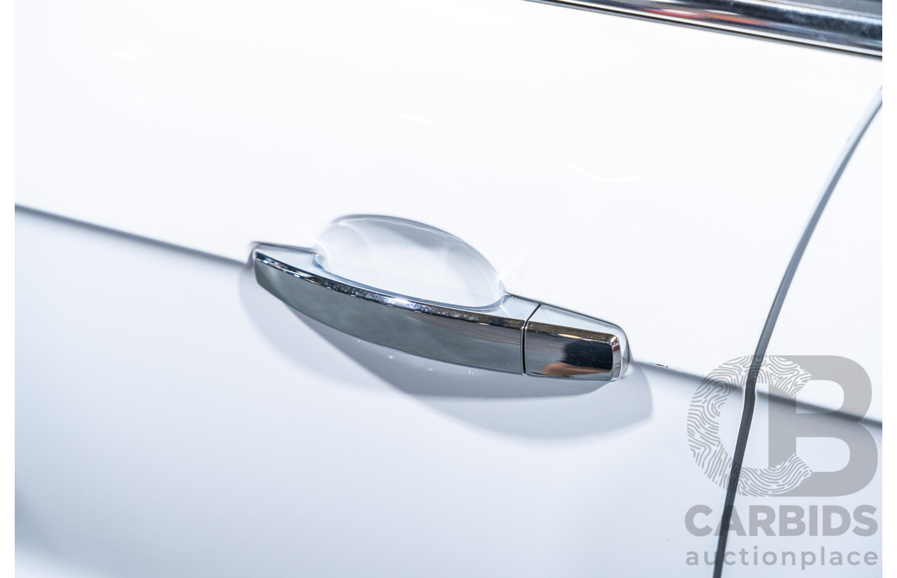 12/2012 Holden Captiva 7 LX (4x4) Series 2 CG MY12 4d Wagon White Turbo Diesel 2.2L - 7 Seater