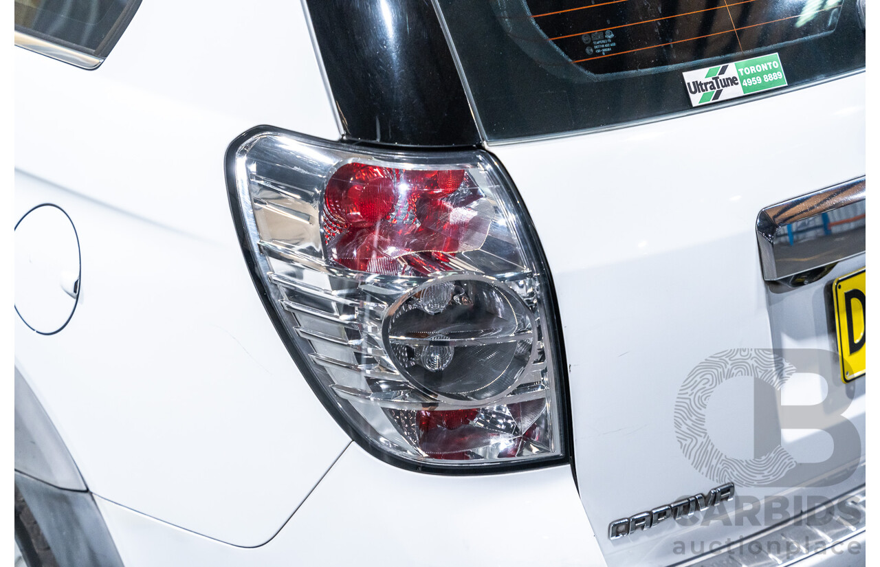 12/2012 Holden Captiva 7 LX (4x4) Series 2 CG MY12 4d Wagon White Turbo Diesel 2.2L - 7 Seater