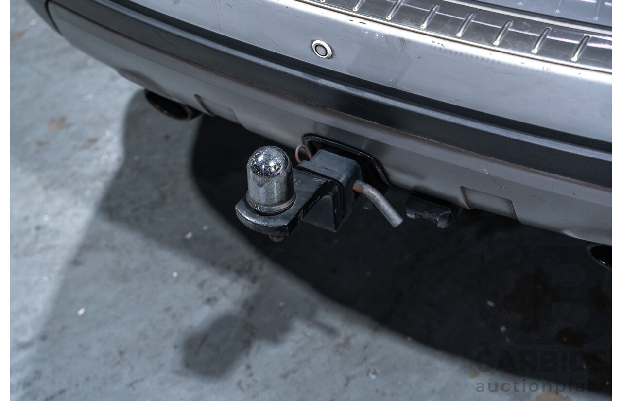 12/2012 Holden Captiva 7 LX (4x4) Series 2 CG MY12 4d Wagon White Turbo Diesel 2.2L - 7 Seater