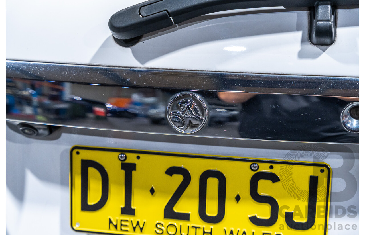 12/2012 Holden Captiva 7 LX (4x4) Series 2 CG MY12 4d Wagon White Turbo Diesel 2.2L - 7 Seater