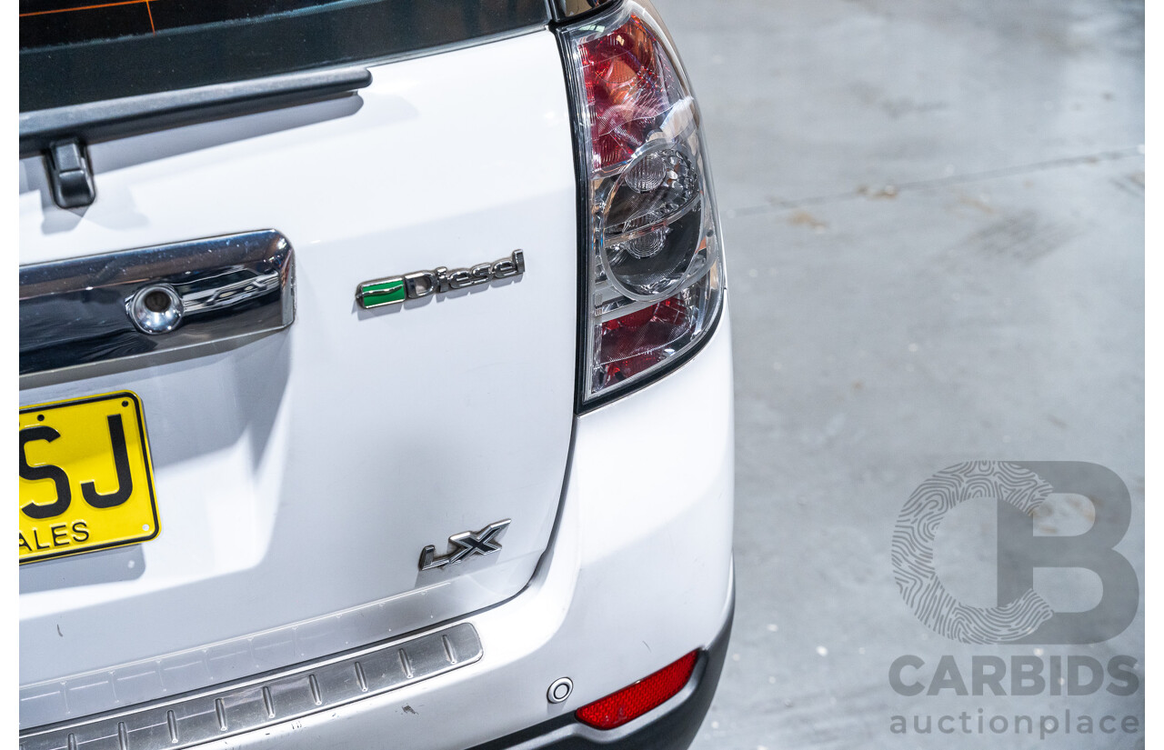 12/2012 Holden Captiva 7 LX (4x4) Series 2 CG MY12 4d Wagon White Turbo Diesel 2.2L - 7 Seater
