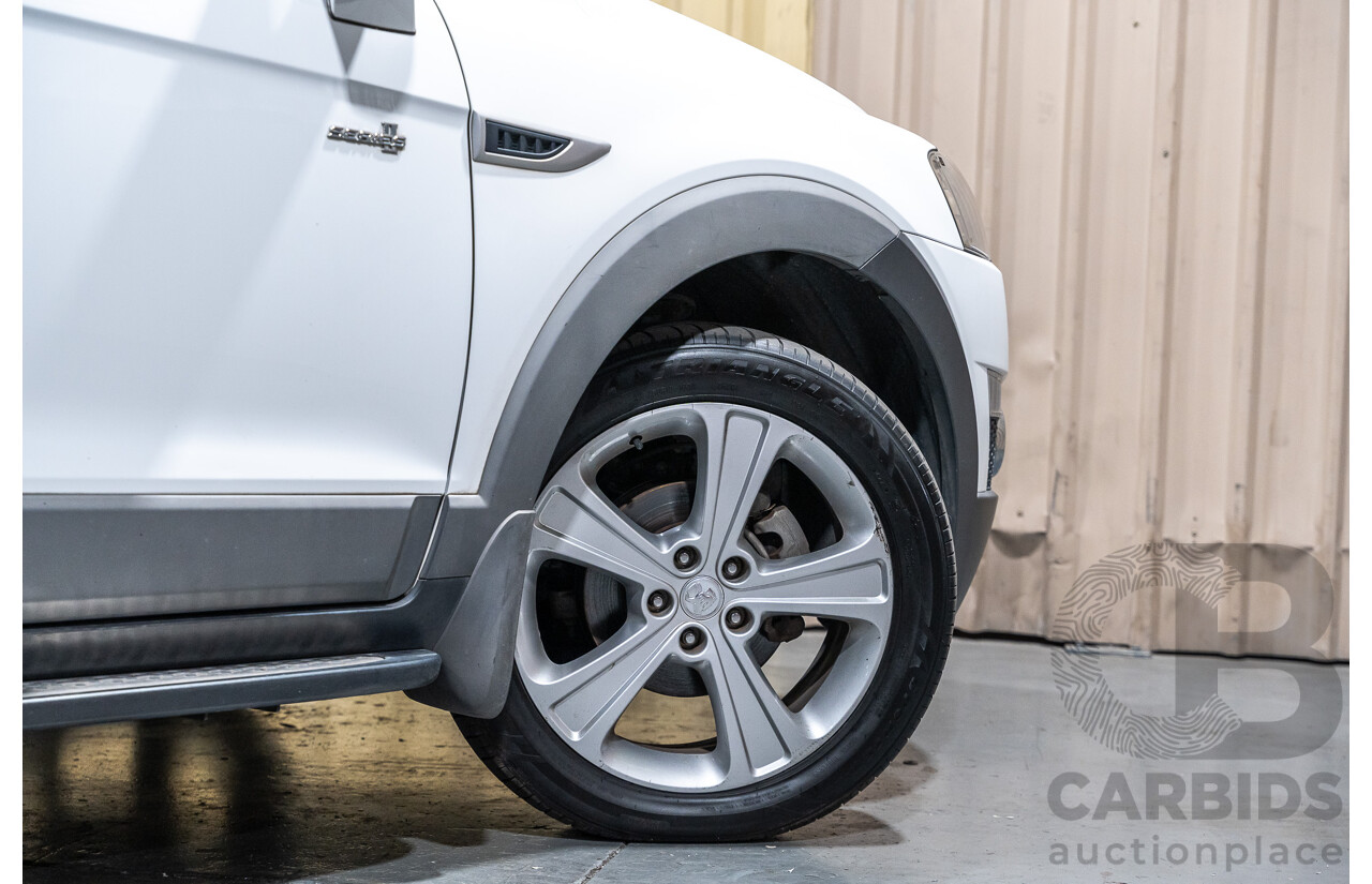 12/2012 Holden Captiva 7 LX (4x4) Series 2 CG MY12 4d Wagon White Turbo Diesel 2.2L - 7 Seater