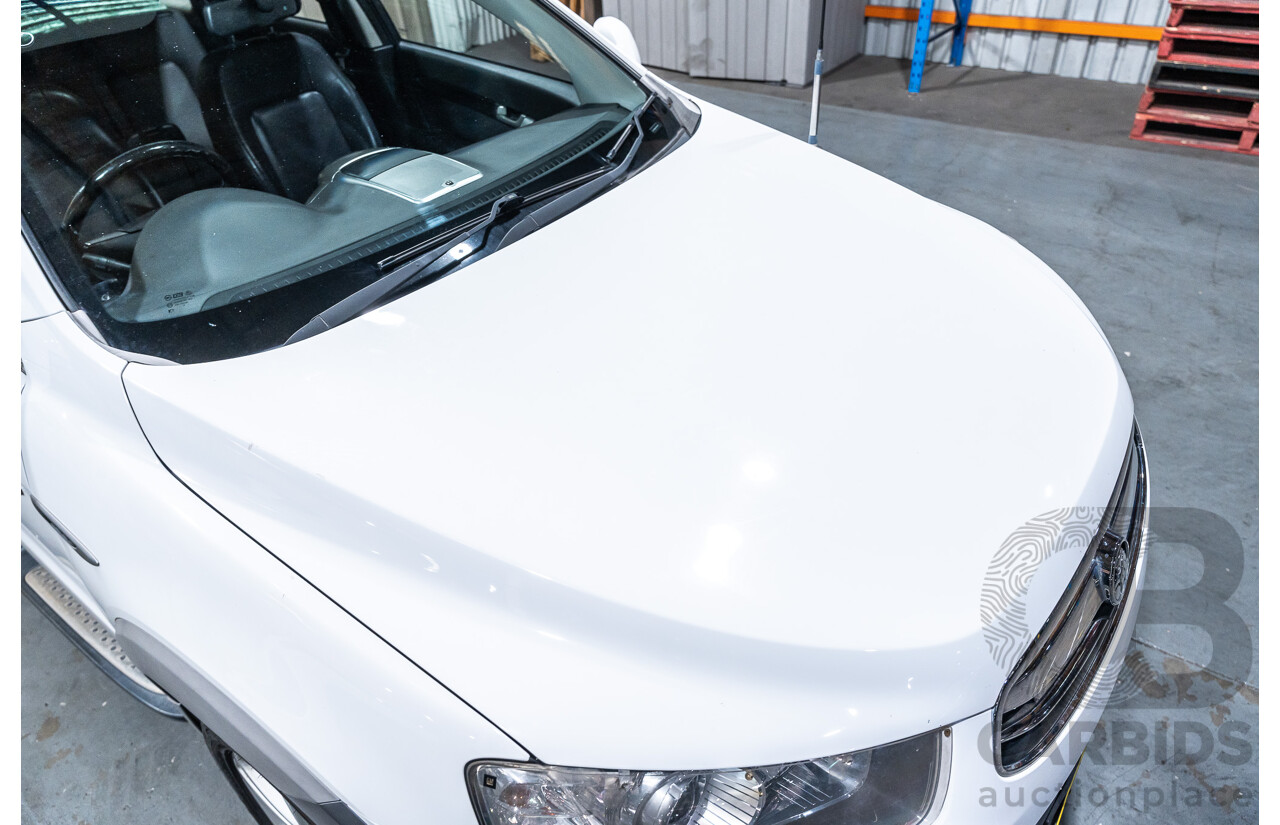 12/2012 Holden Captiva 7 LX (4x4) Series 2 CG MY12 4d Wagon White Turbo Diesel 2.2L - 7 Seater