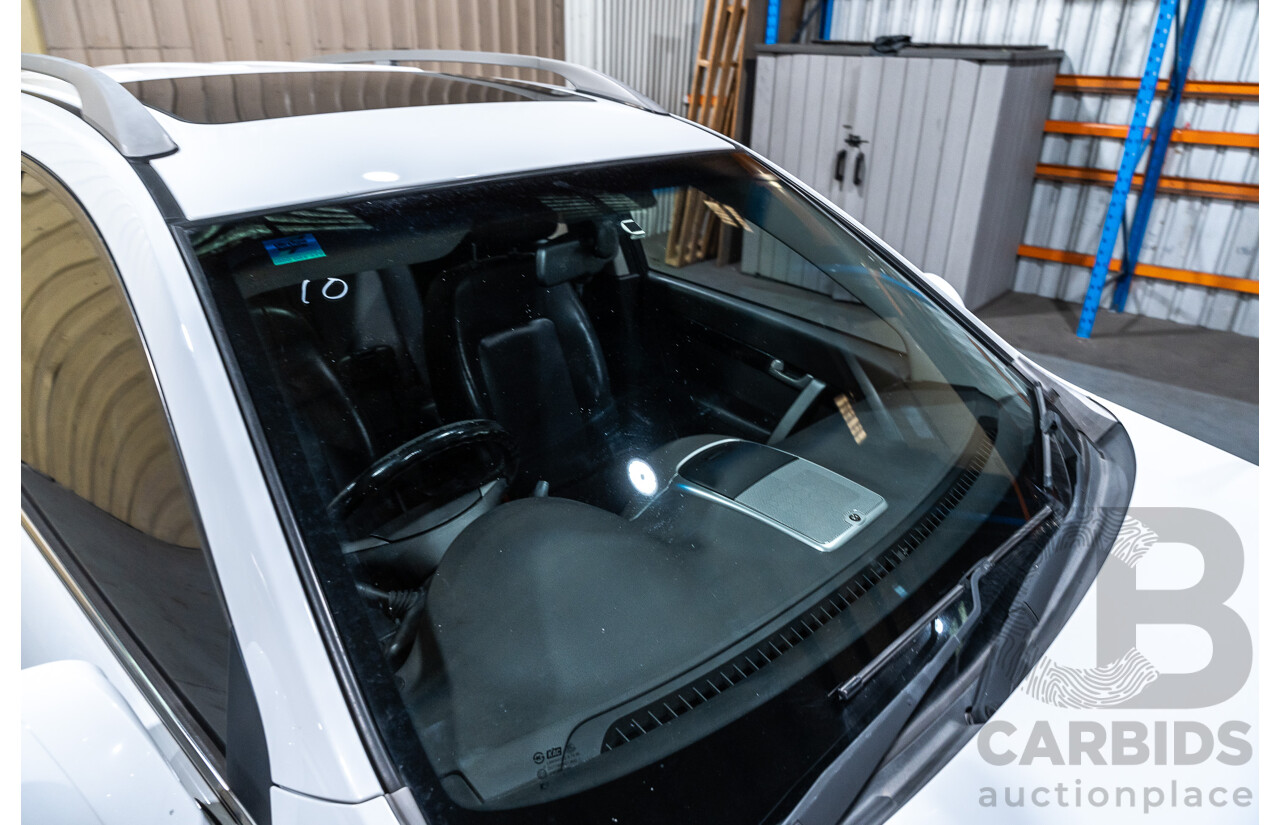 12/2012 Holden Captiva 7 LX (4x4) Series 2 CG MY12 4d Wagon White Turbo Diesel 2.2L - 7 Seater