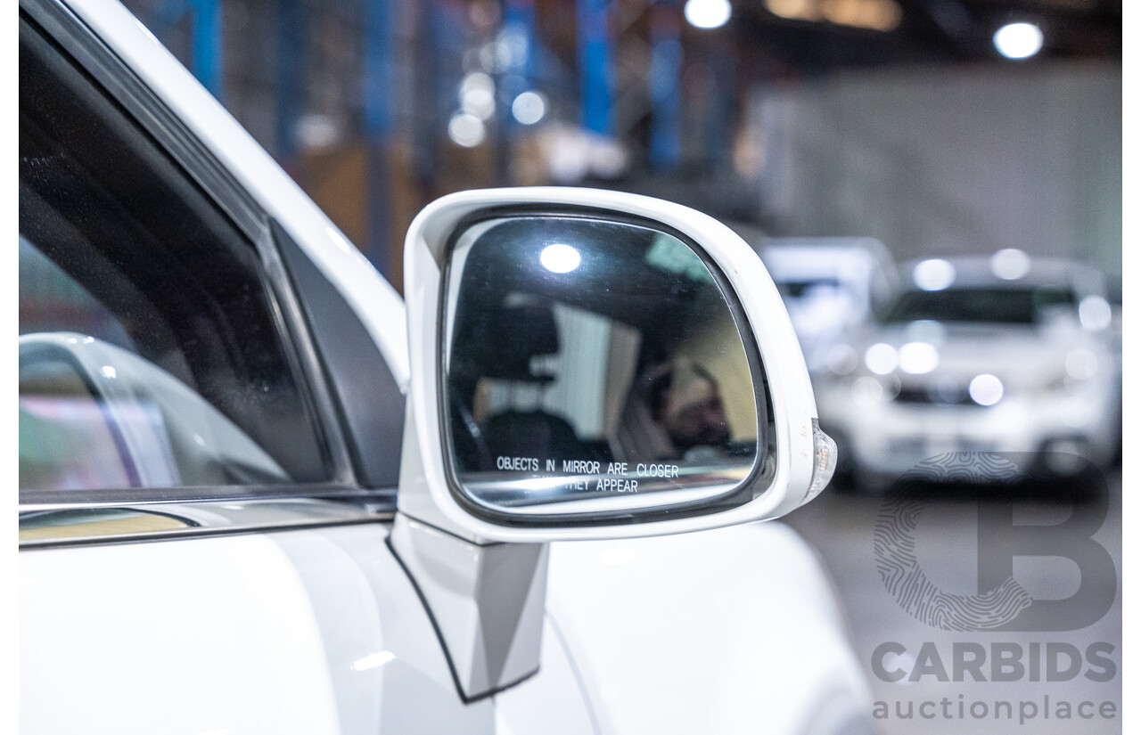 12/2012 Holden Captiva 7 LX (4x4) Series 2 CG MY12 4d Wagon White Turbo Diesel 2.2L - 7 Seater