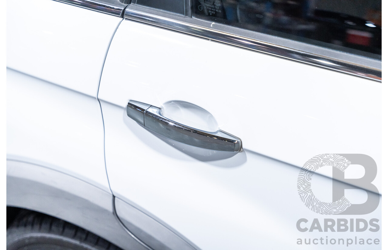 12/2012 Holden Captiva 7 LX (4x4) Series 2 CG MY12 4d Wagon White Turbo Diesel 2.2L - 7 Seater