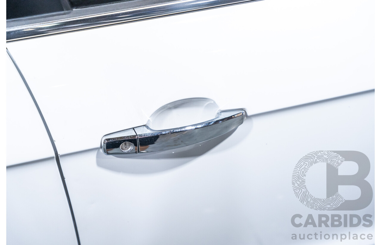 12/2012 Holden Captiva 7 LX (4x4) Series 2 CG MY12 4d Wagon White Turbo Diesel 2.2L - 7 Seater