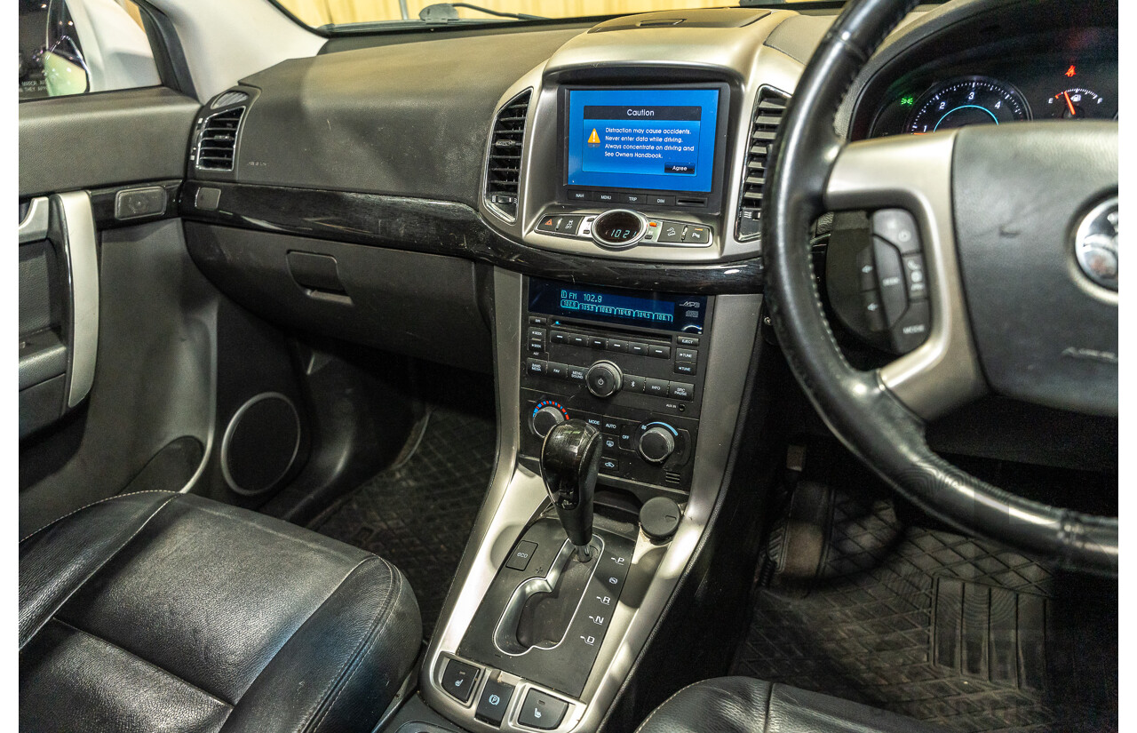 12/2012 Holden Captiva 7 LX (4x4) Series 2 CG MY12 4d Wagon White Turbo Diesel 2.2L - 7 Seater