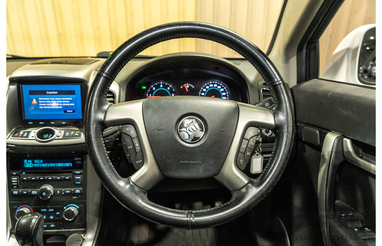 12/2012 Holden Captiva 7 LX (4x4) Series 2 CG MY12 4d Wagon White Turbo Diesel 2.2L - 7 Seater