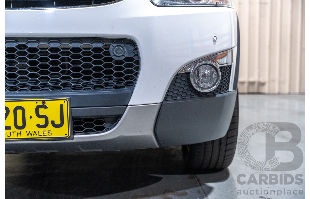 12/2012 Holden Captiva 7 LX (4x4) Series 2 CG MY12 4d Wagon White Turbo Diesel 2.2L - 7 Seater