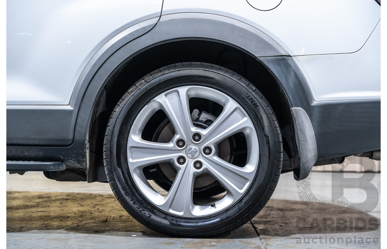 12/2012 Holden Captiva 7 LX (4x4) Series 2 CG MY12 4d Wagon White Turbo Diesel 2.2L - 7 Seater