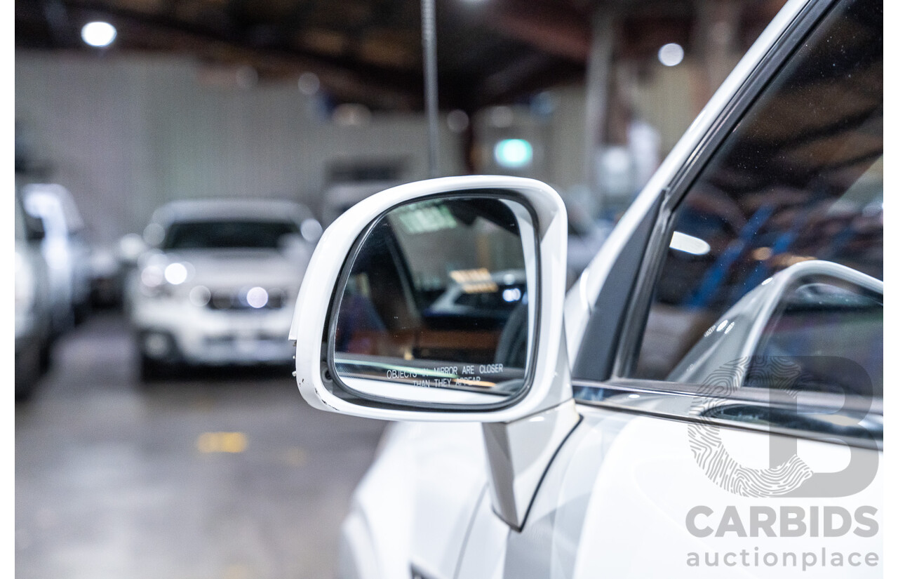 12/2012 Holden Captiva 7 LX (4x4) Series 2 CG MY12 4d Wagon White Turbo Diesel 2.2L - 7 Seater