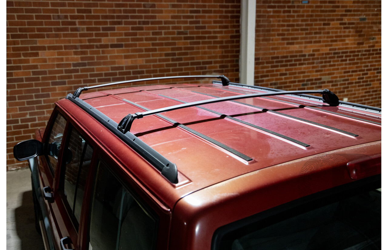 5/1998 Jeep Cherokee Sport (4x4) XJ 4d Wagon Red 4.0L