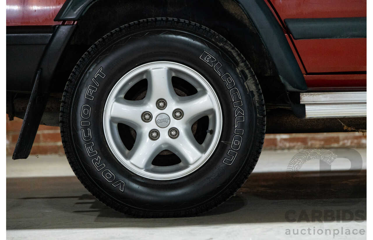 5/1998 Jeep Cherokee Sport (4x4) XJ 4d Wagon Red 4.0L