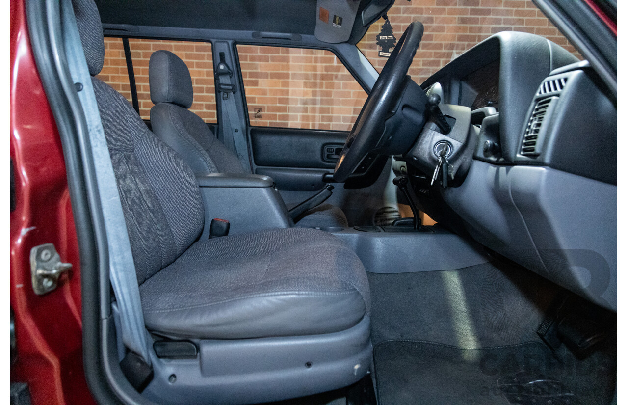 5/1998 Jeep Cherokee Sport (4x4) XJ 4d Wagon Red 4.0L