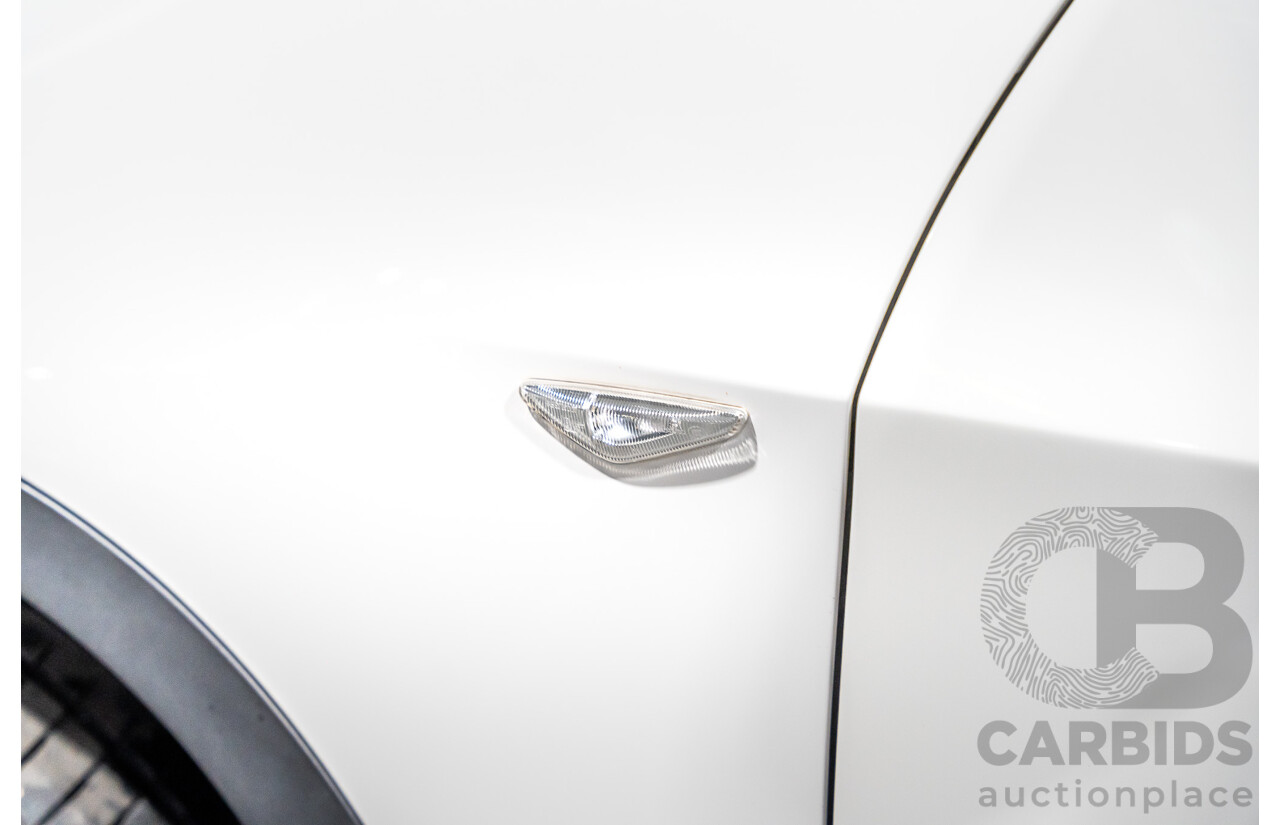 7/2010 BMW X5 Xdrive 40d Sport E70 (4x4) MY10 4d Wagon White Twin Turbo Diesel 3.0L