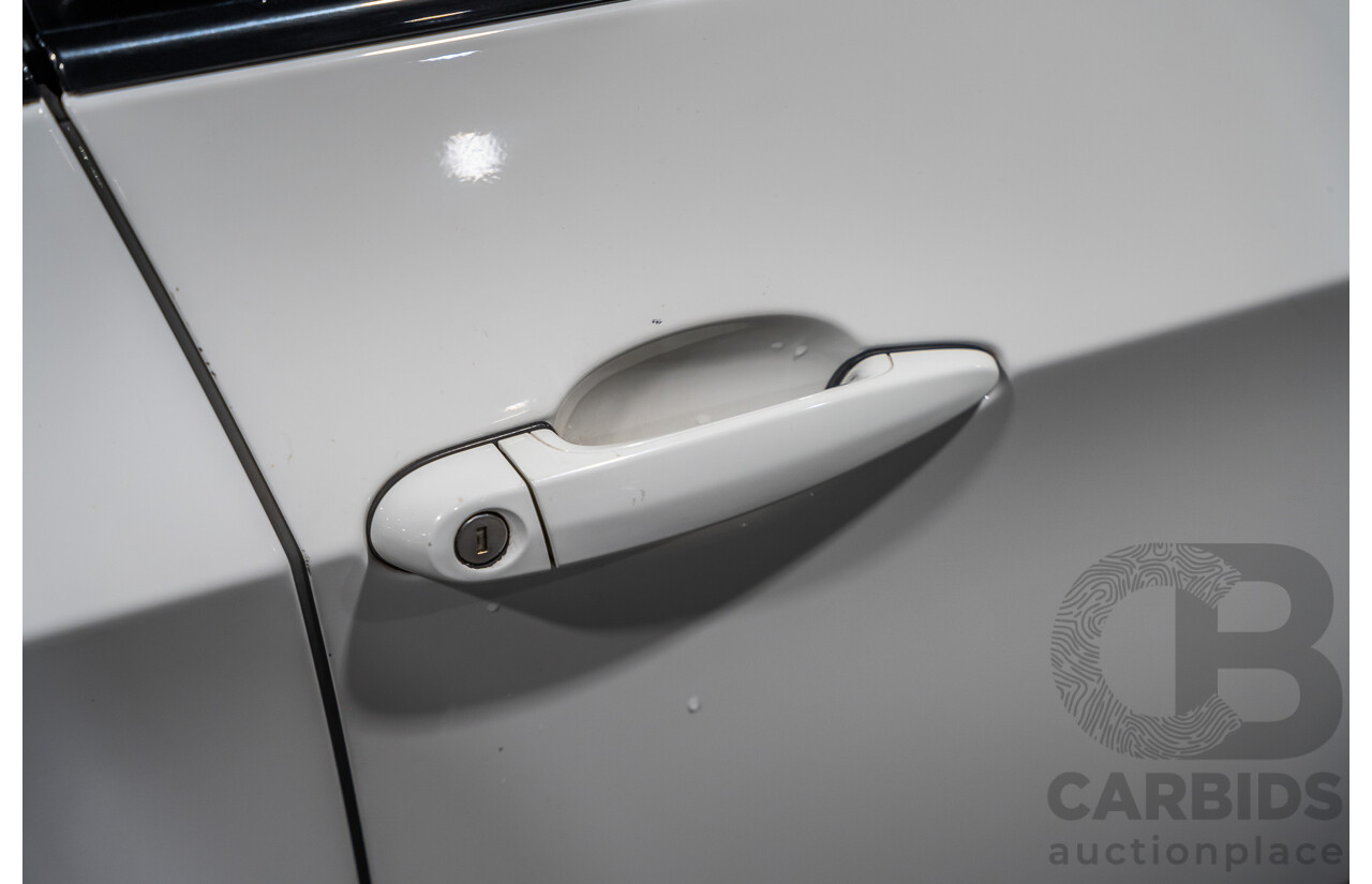 7/2010 BMW X5 Xdrive 40d Sport E70 (4x4) MY10 4d Wagon White Twin Turbo Diesel 3.0L