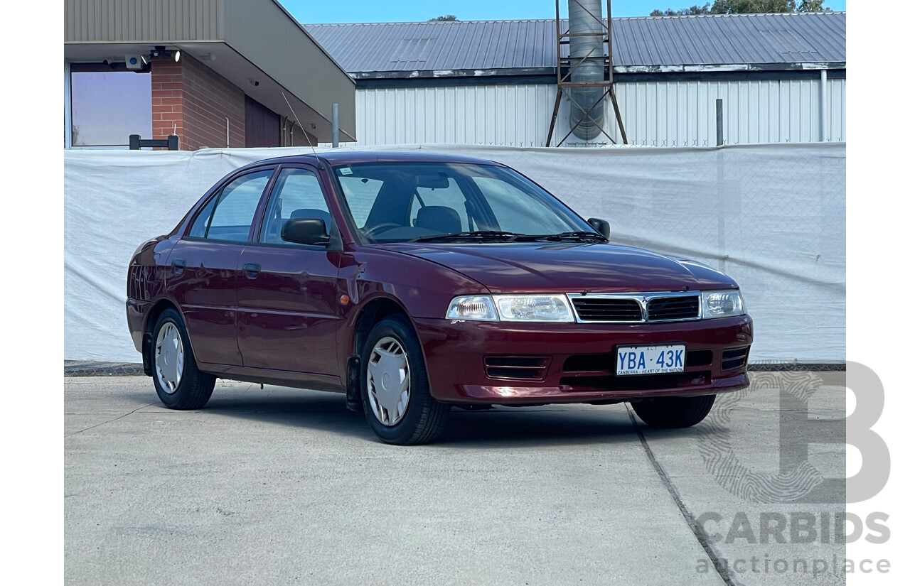 04/2000 Mitsubishi Lancer GLXi FWD CE 4D Sedan Red 1.8L