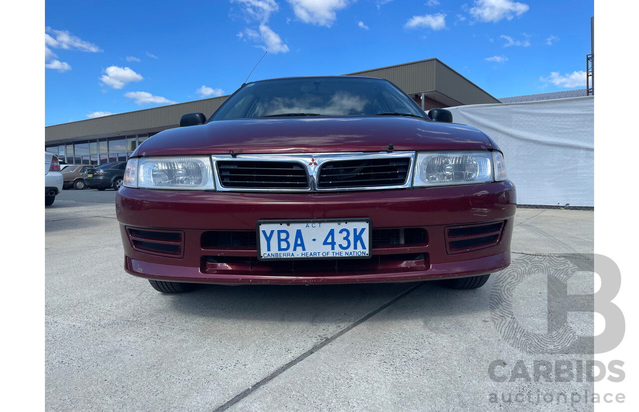 04/2000 Mitsubishi Lancer GLXi FWD CE 4D Sedan Red 1.8L