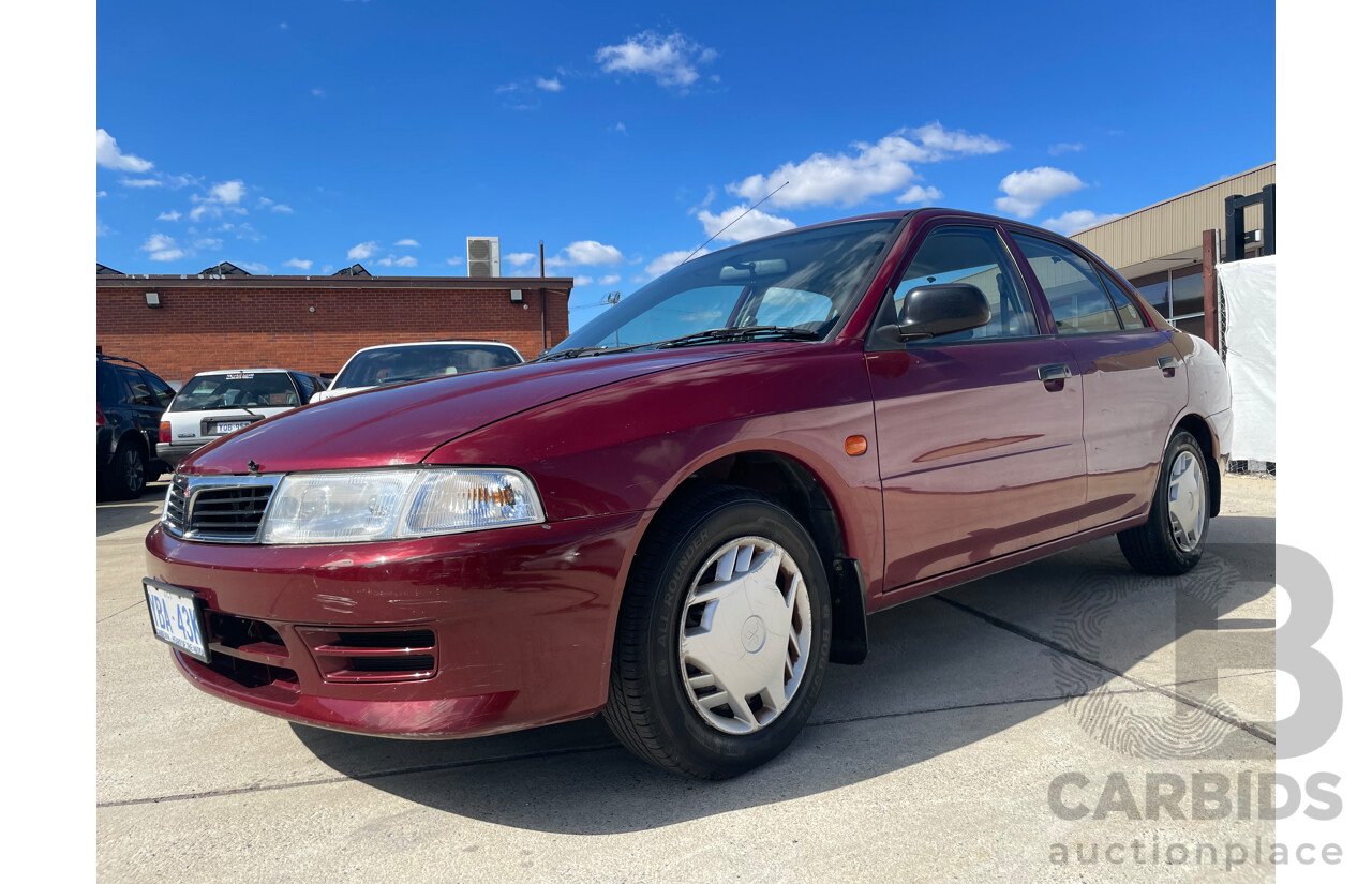 04/2000 Mitsubishi Lancer GLXi FWD CE 4D Sedan Red 1.8L