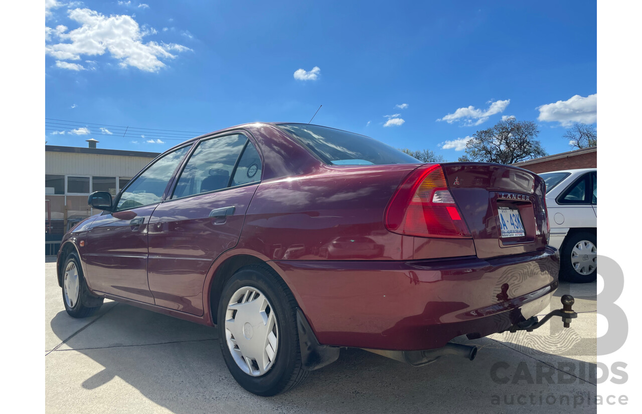 04/2000 Mitsubishi Lancer GLXi FWD CE 4D Sedan Red 1.8L