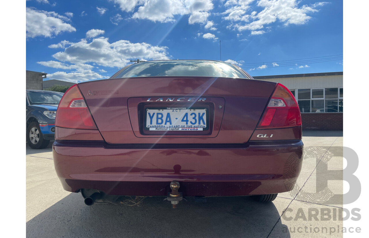 04/2000 Mitsubishi Lancer GLXi FWD CE 4D Sedan Red 1.8L