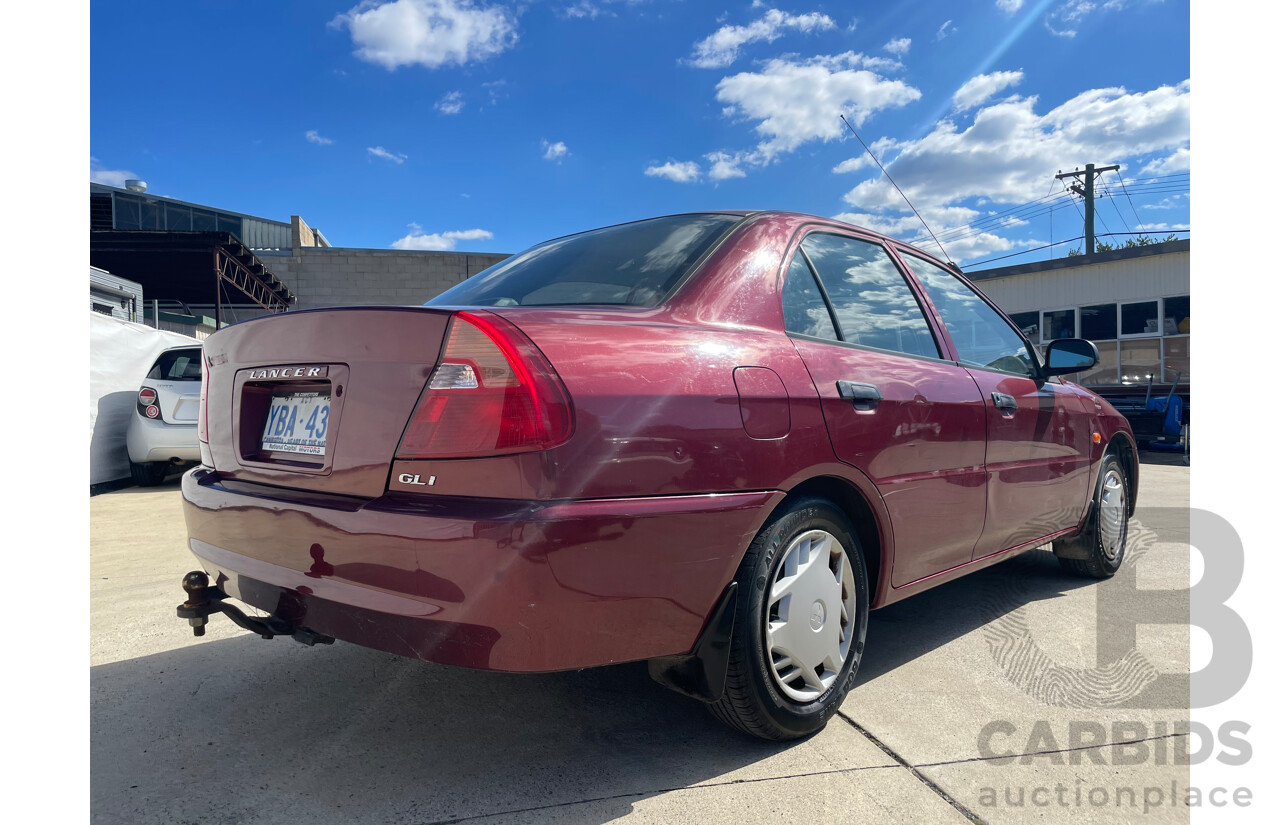 04/2000 Mitsubishi Lancer GLXi FWD CE 4D Sedan Red 1.8L