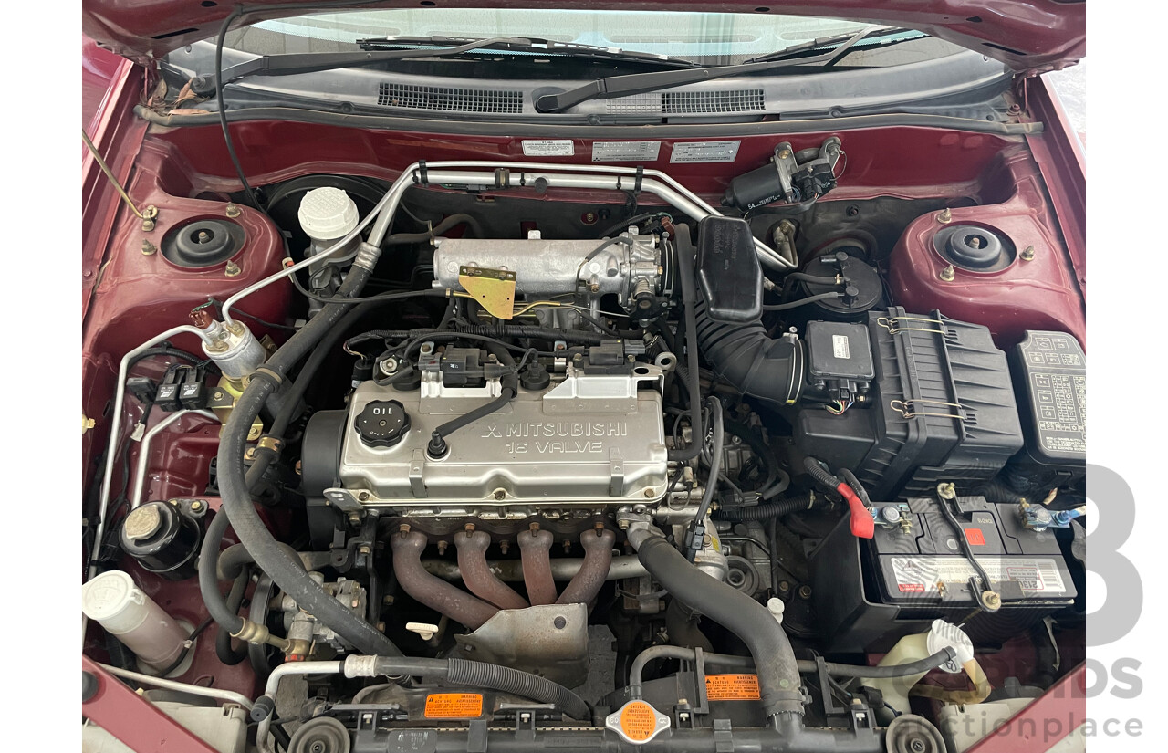04/2000 Mitsubishi Lancer GLXi FWD CE 4D Sedan Red 1.8L
