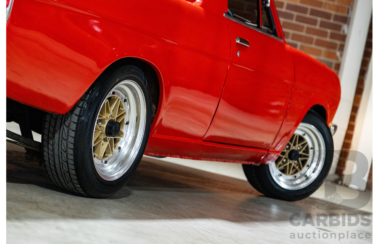 3/1974 Datsun 1200 B120 2d Utility Red 1.2L