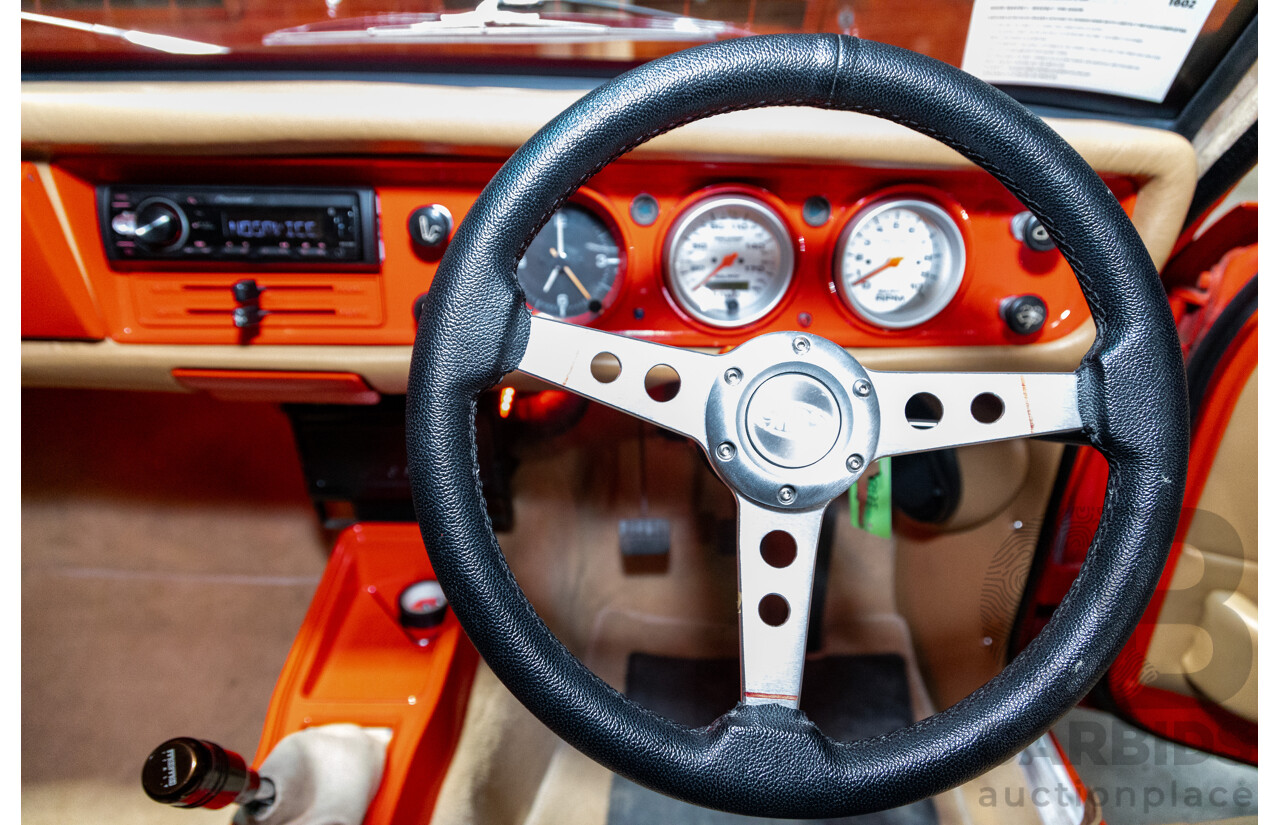 3/1974 Datsun 1200 B120 2d Utility Red 1.2L