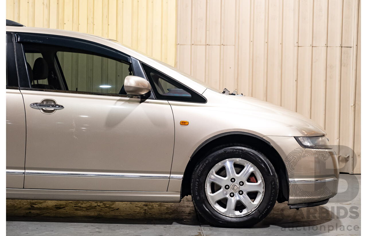 9/2005 Honda Odyssey 4d Wagon Metallic Gold 2.4L