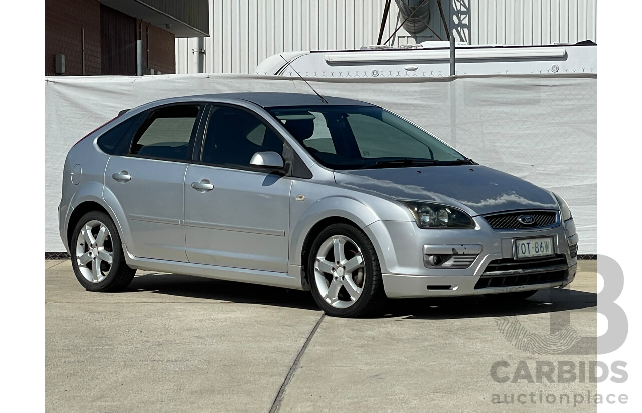 10/2006 Ford Focus ZETEC FWD LS 5D Hatchback Silver 2.0L