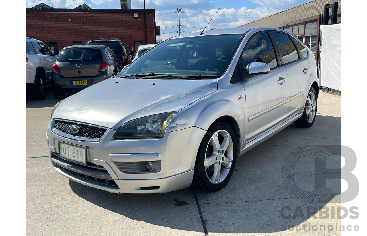 10/2006 Ford Focus ZETEC FWD LS 5D Hatchback Silver 2.0L