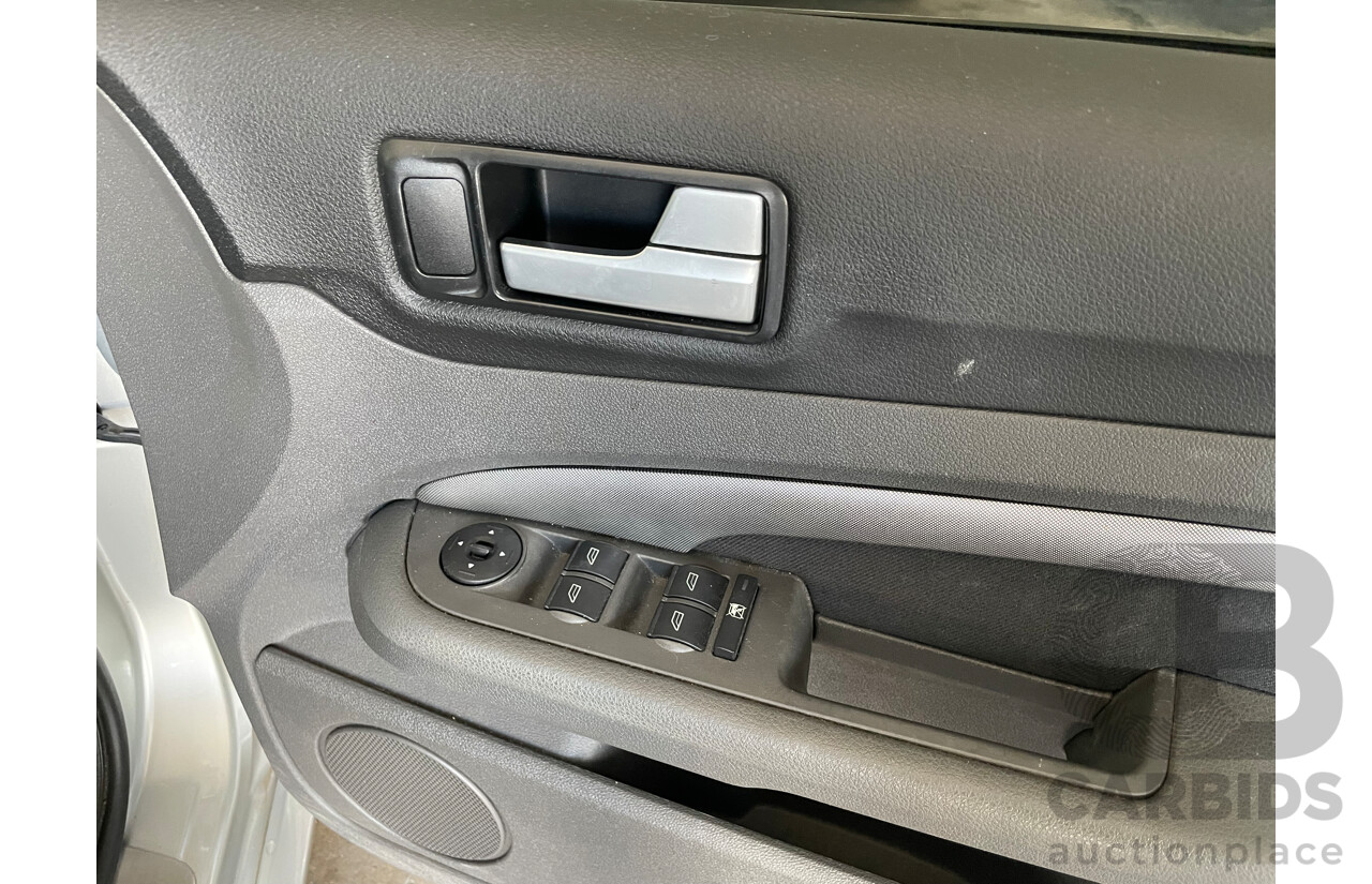 10/2006 Ford Focus ZETEC FWD LS 5D Hatchback Silver 2.0L