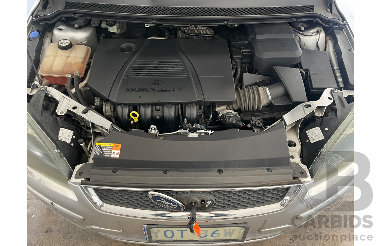 10/2006 Ford Focus ZETEC FWD LS 5D Hatchback Silver 2.0L