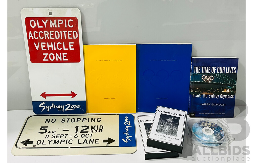 Collection of Sydney Olympics 2000 Memorabilia Including Traffic Signs, Open and Closing Ceremonies Commemorative Books and More