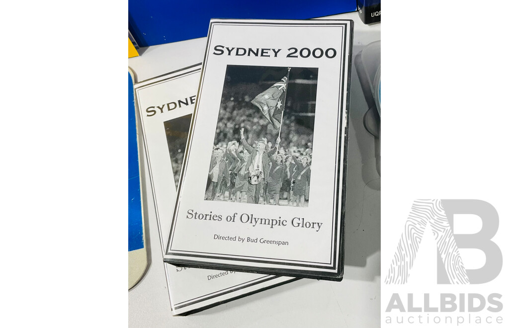 Collection of Sydney Olympics 2000 Memorabilia Including Traffic Signs, Open and Closing Ceremonies Commemorative Books and More