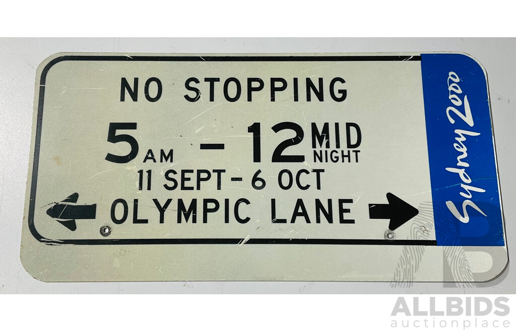 Collection of Sydney Olympics 2000 Memorabilia Including Traffic Signs, Open and Closing Ceremonies Commemorative Books and More