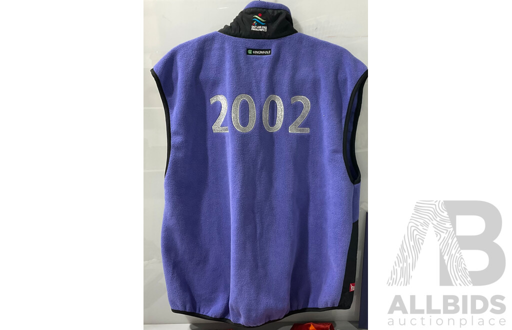 Salt Lake 2002 Paralympics Fleece Vest and Watch, Alongside Olympic Starting Bib, and Three Copies of the Opening Ceremony Booklet 2002 Salt Lake Olympic Winter Games