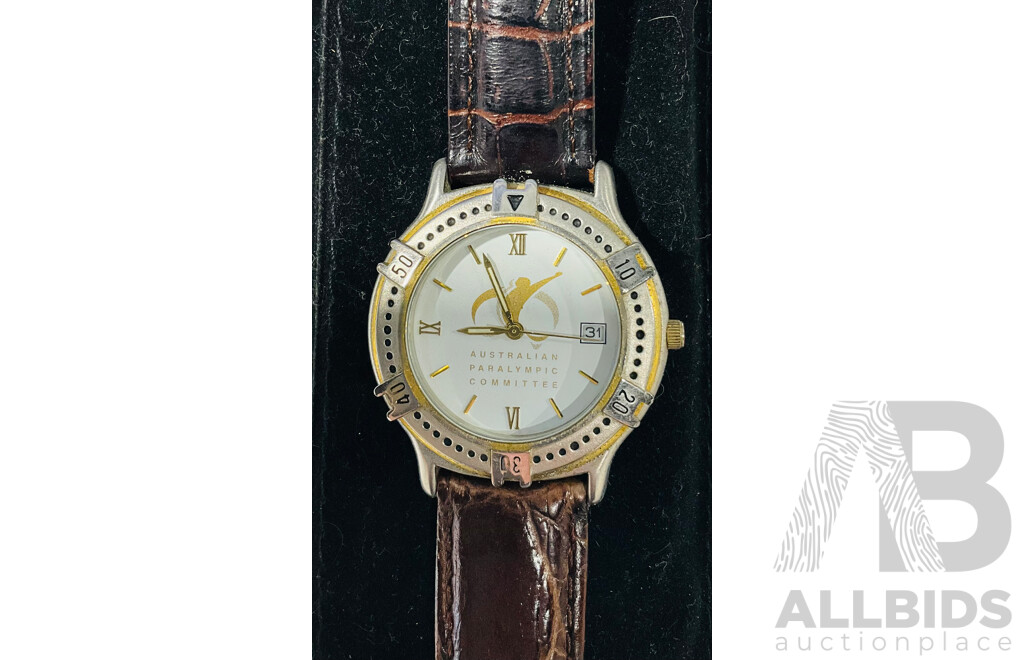 Salt Lake 2002 Paralympics Fleece Vest and Watch, Alongside Olympic Starting Bib, and Three Copies of the Opening Ceremony Booklet 2002 Salt Lake Olympic Winter Games