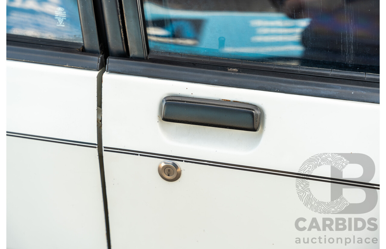 4/1986 Ford Falcon S-Pak XF 4d Sedan Sno White 4.1L