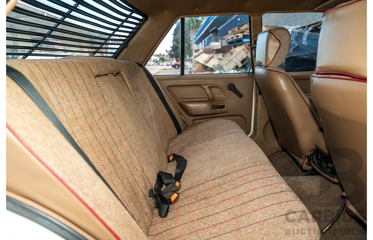 4/1986 Ford Falcon S-Pak XF 4d Sedan Sno White 4.1L